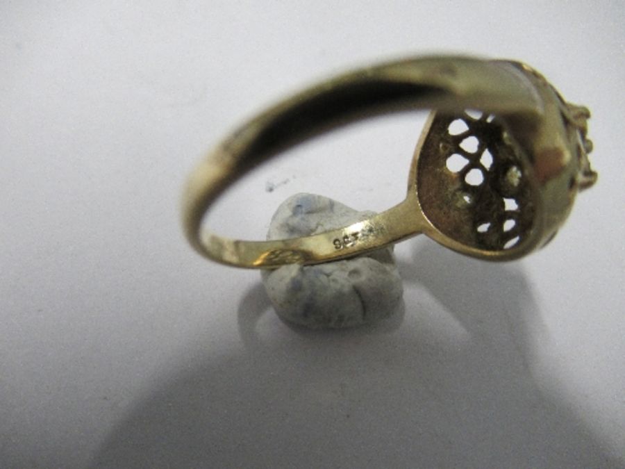 A synthetic stone set dress ring, stamped '9ct', finger size P, 2.8g gross - Image 4 of 4
