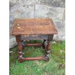 An oak coffin stool, of rectangular form, 16.5ins x 11ins, height 18.5ins