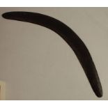 An antique Australian boomerang, probably Western desert, carved and adzed hardwood of plano-