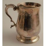 An 18th century silver mug, of baluster form, London 1783, weight 12oz, height 5.25ins - thin