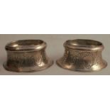 A pair of 18th century silver trencher salts, of oval form with engraved decoration, London 1770,