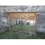 A Regency design triple plate mirror, the gilded frame having classical decoration, width 55ins x