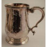 An 18th century silver mug, of baluster form, London 1759, weight 11oz, height 5ins - There are no