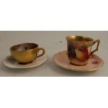 A Royal Worcester miniature tea cup and saucer, decorated with pheasants by James Stinton,