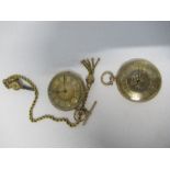 Two 18K gold pocket watches, one on a chain