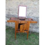 A 19th century mahogany folding pot cupboard / dressing table, the top opening to reveal apertures