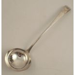 An 18th century silver ladle, with bright cut decoration to the handle and a Heron under script "
