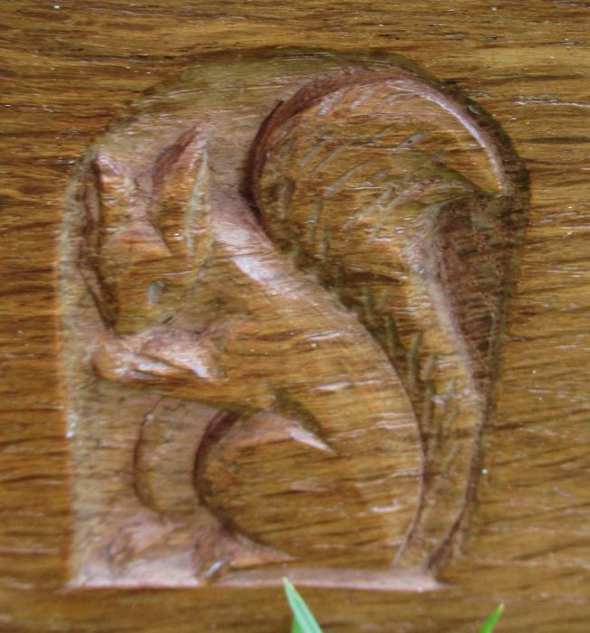 Wilf Squirrel Man Hutchinson, an oak corner cabinet, with panelled door, width 27.5ins, height 36. - Image 4 of 4