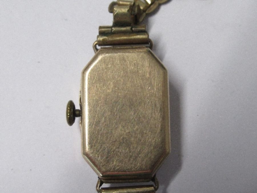 A lady's 9 carat gold mechanical wrist watch, on a metal bracelet, together with another similar - Image 6 of 7