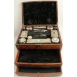 A 19th century walnut dressing table box, the hinged lid opening to reveal a fitted lift out tray,