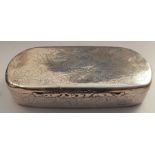 An Oriental silver snuff box, of rectangular form, being engraved all over with scrolls and