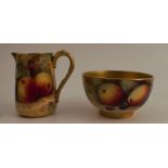 A Royal Worcester milk jug and sugar bowl, both decorated all around with fruit to a mossy