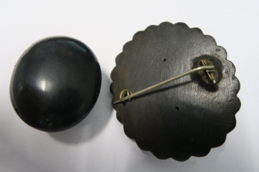 A cameo brooch, simulating jet, together with a locket - Image 2 of 3