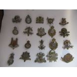 A quantity of British cavalry regiment badges, to include Lancers, The Royal Dragoons, Life