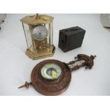 A Kundo hexagonal shaped clock, with ball movement, together with an oak cased barometer and a Kodak