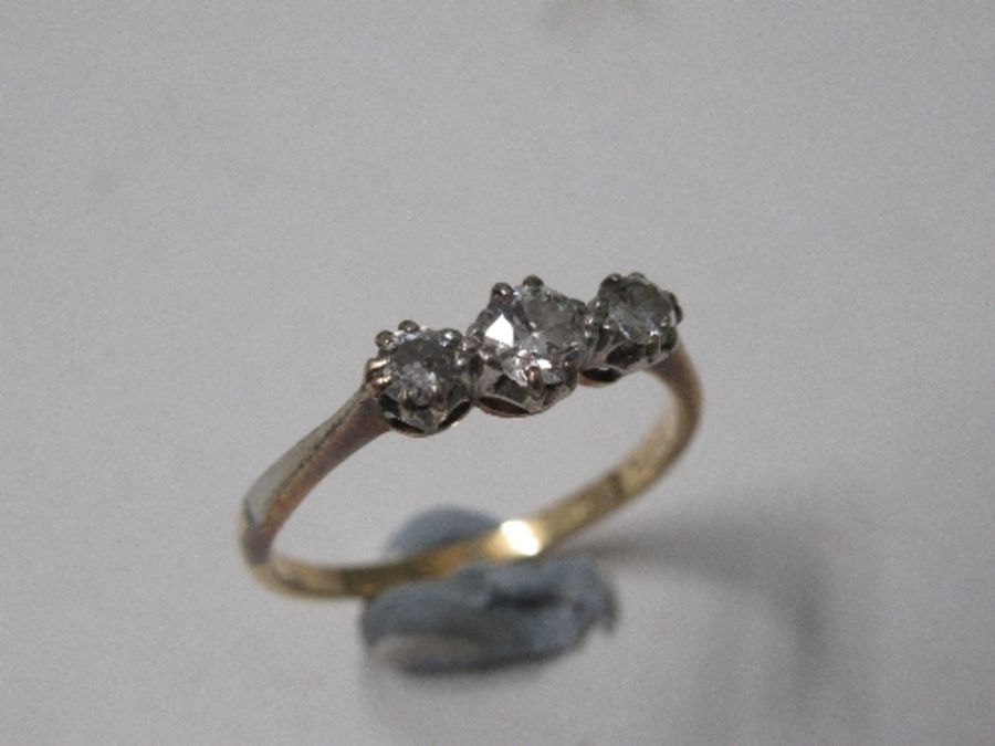 An 18carat gold and platinum three stone diamond ring, finger size S - Image 2 of 4