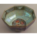 A Wedgewood lustre octagonal shaped bowl, decorated to the exterior with a serpent to a blue ground,