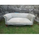A two seater sofa, raised on short cabriole legs, width 60ins x depth 28ins x height 26in
