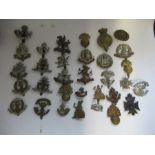 A quantity of British Infantry Regiments of the Line Cap Badges, to include Middlesex, North and