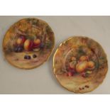 Two Royal Worcester cabinet plates, decorated with fruit to a mossy background by H H Price, both