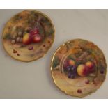 Two Royal Worcester cabinet plates, decorated with fruit to a mossy background by H H Price, both