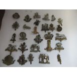 A quantity of British cavalry regiment badges, to include The Kings Own Hussars, Royal Hussars,