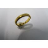 A plain 22 carat gold wedding ring, 5.6g gross