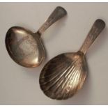 Two Georgian silver caddy spoons, one with shell bowl and engraved handle the other with engraved