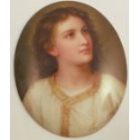 A Heubach oval porcelain plaque, decorated with a portrait of a saint by Hoffman, signed and