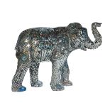 We are the Music Makers A mosaic elephant with mirrored tiles, delicately cut to create intricate