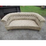 A 19th century drop end curved sofa, length 76ins, depth 36ins