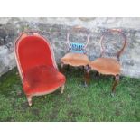 A 19th century easy chair, raised on turned front legs, together with a pair of Victorian hoop