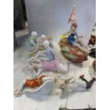Eight Continental porcelain models, of women in bathing costumes, one as a pot lid