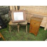 A hanging cabinet, two chairs and a pot cupboard