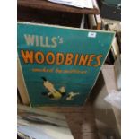 A Will's Woodbine metal sign, 30ins x 19ins, together with an AGI 1951 calendar and two pictures