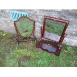 Two swing frame toilet mirrors, one with painted floral decoration