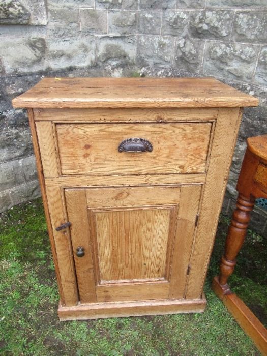 A pine cabinet, having cupboard door below a drawer, width 27ins x depth 14ins x height 39ins, - Image 2 of 4