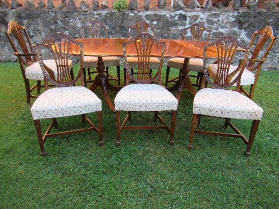 A twin pedestal dining table, with extra leaf, width 39ins x length 84ins, together with a set of