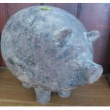 A terracotta pig money box, height 11ins