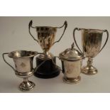 Four various hallmarked silver trophy cups, one on a base, weight 3oz