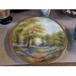 A Royal Worcester cabinet plate, decorated with a view of Bluebells Kew Garden, diameter 11ins