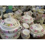 A Royal Worcester Royal Garden dinner and tea service, comprising covered tureens, various plates,