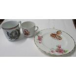 Three items of commemorative ware, a plate and cup relating to Lord Kitchener, plate diameter