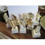 Nine Royal Worcester models, of horses heads on plinth bases, height 5.5ins - One of the horses