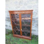 A Georgian design glazed cabinet, the astragal glazed doors opening to reveal shelves, width 34ins x