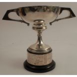 A silver two handled trophy cup, presented by Highbury School, Chester 1911, weight approx. 8oz