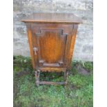 An oak pot cupboard, width 15ins x depth 15.75ins x height 36ins, together with an oak framed