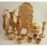 A collection of early 20th century Middle Eastern gilt brassware, to include ewer, height 14ins,