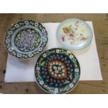 Two decorative wall plates, diameter 12ins, together with another plate