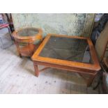 An American reproduction glass top coffee table, width 41ins x height 17.5ins, together with a